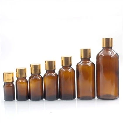 بطری اسانس گرد شیشه ای کهربایی با درپوش پیچ